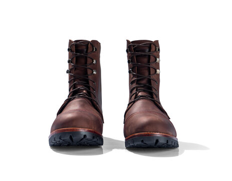 Work boots with oil leather isolated on white background, in front view