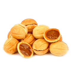 Nut with condensed milk on a white background