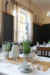 decorative plant on the table at a wedding reception, table setting