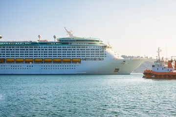 Cruise ship docked in port in town Bar, Montenegro on Adriatic sea. Summer vacation destination in...