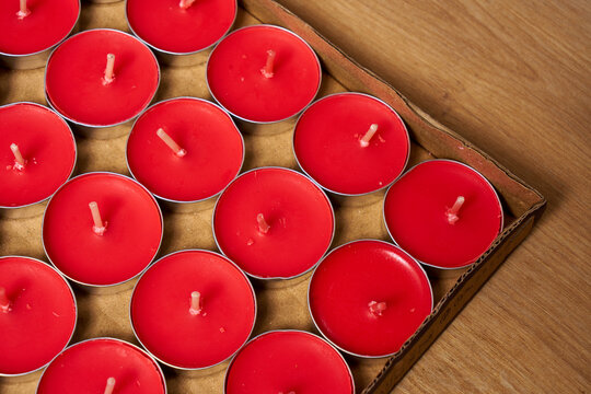 Red tealight candles on a table.