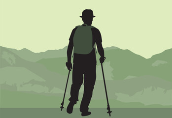 Mountain hike, silhouette of a man with a backpack.