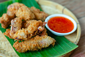 Fried Squid or Calamari served on plate.