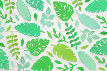 Composition of cut paper tropical palm leaves, Monstera and banana leaves. Handmade nature mockup,...