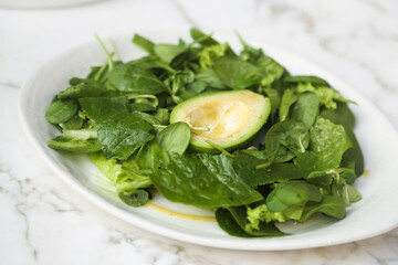 Healthy leaf salad with avocado