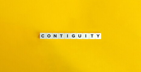 Contiguity Word on Letter Tiles on Yellow Background. Minimal Aesthetic.