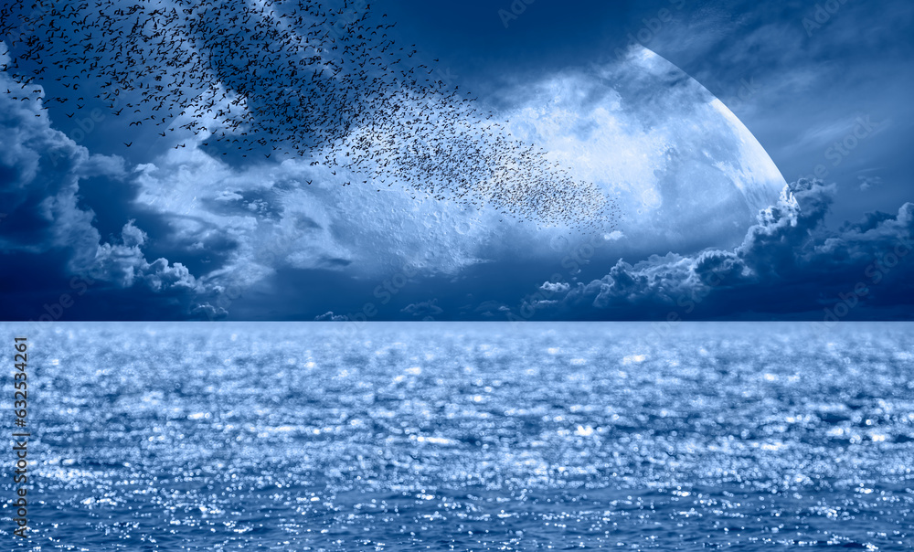 Poster Flock of starlings migrating to the moon - Silhouette of flock birds flying with full moon at sunset or sunrise 
