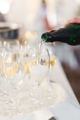 Alcoholic drink in a glass at a wedding reception close-up