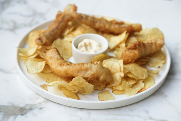 Traditional fish and chips with sauce