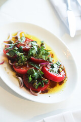 Healthy tomato salad with capers
