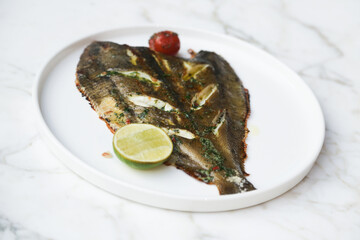 Baked fish with fresh lime