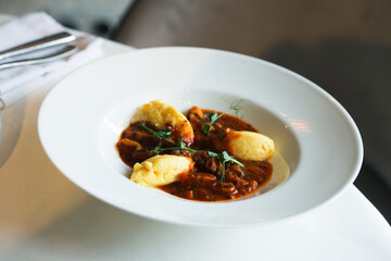 Traditional polenta served with tomato sauce