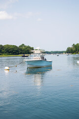 Horizontal photo of a parked yacht on the water