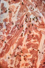 Fototapeta premium A piece of raw meat, close-up. Raw food for cooking.