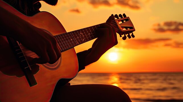 Musician Playing Acoustic Guitar Silhouette At Sunset