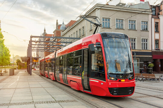 Red modern tram in the center of Katowice, Poland