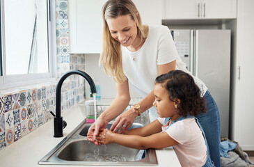 Mother, child and washing hands at kitchen sink at home for good hygiene, health and wellness. A...