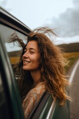 Fototapeta na wymiar a young woman enjoying a road trip