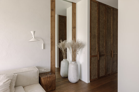 Aesthetic Wabi Sabi Living Room Interior Design In Brown And Off White Shades With Solid Oak And Rattan Furniture. Wabi Sabi Inspiration. Slow Living Concept