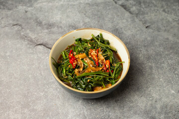 Morning Glory with oyster Sauce served in dish isolated isolated on background top view of bangladesh food