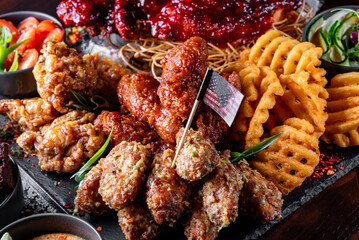 set of assorted grilled meat platter with differend chicken nuggets and vegetables 