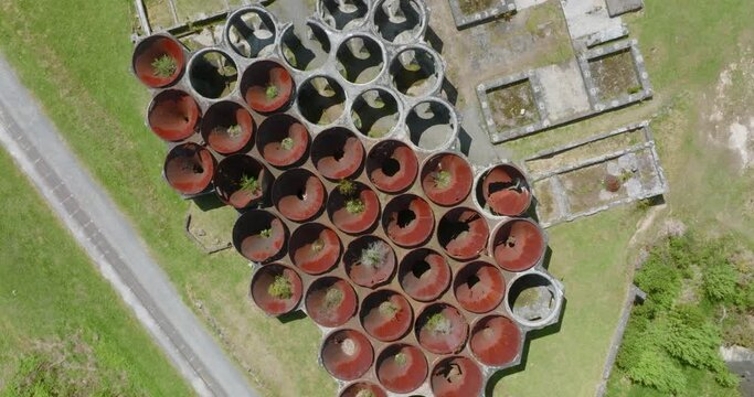 Aerial: Victoria Battery, an abandoned gold ore crushing battery in Paeroa, New Zealand. It was one of the country's foremost industrial sites.