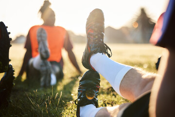 Rugby, stretching legs and people on field for sports, team training or together in the morning....