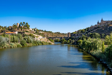 Fototapeta na wymiar Panoramic view of Toledo, Spain, UNESCO World Heritage. Tagus River, Old Town and Alcazar.
