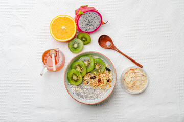 Bowls of oatmeal with mixed fruits topping