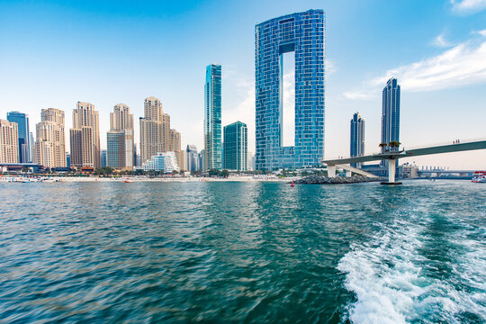 Dubai, UAE &ndash; april 11, 2023: Dubai Marina, Address Beach Resort, Bluewaters pedestrian bridge, DXB Lux Condo