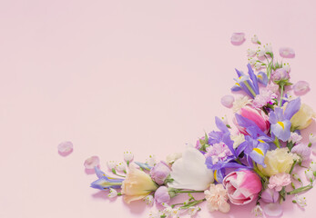 beautiful spring flowers on purple background