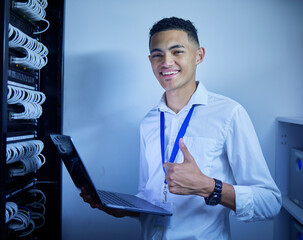 Man, thumbs up and server room on computer in cybersecurity, IT cables and hardware or data safety solution. Electrician, engineering portrait and laptop with like or good job in software programming