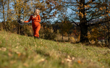 Pregnant walking sunny autumn outdoor