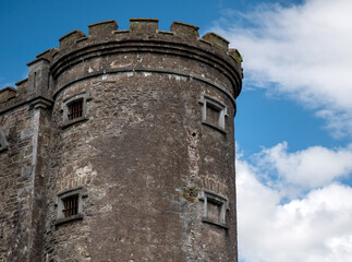 Fototapeta na wymiar Old celtic castle tower walls, Cork City Gaol prison in Ireland. Fortress, citadel background
