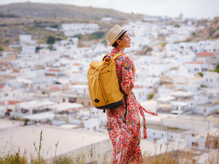 Nice Happy Female Enjoying Greek Islands. Travel to Greece, Mediterranean islands outside tourist...