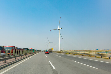 Under the background of sunny day, the appearance of a power plant is very beautiful