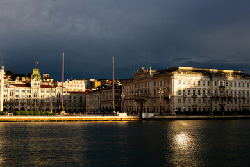 trieste seafront at sunset after heavy rain