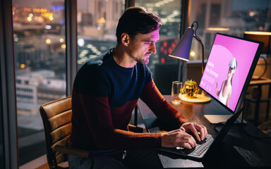 VR developer working in his office at night