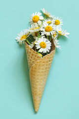 waffle cone with a bouquet of flowers
