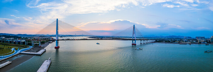 Shantou City, Guangdong Province, China. Chinese translation on the bridge:Shantou Queshi bridge