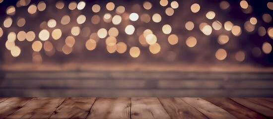 Old table with bookeh lights. Christmas style products stage. 
