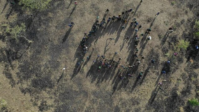 Aerial view of suri tribe warriors fighting during a donga Omo Ethiopia