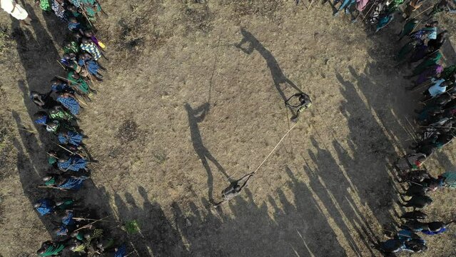 Aerial view of suri tribe warriors fighting during a donga Omo Ethiopia