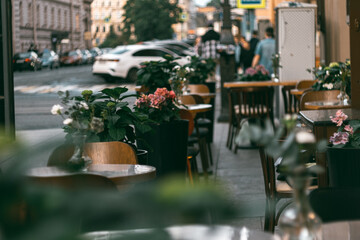 terrace restaurant summer background of a sunny evening promenade.Takeaway menu 