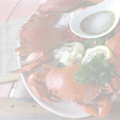 Blurred image of orange crab that is a Thai food.