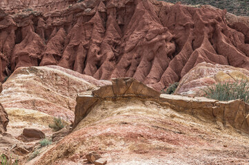 Bizarre bends of sandy canyons.Natural terracotta background.