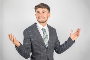 Portrait of a business man in a suit & tie looking happy