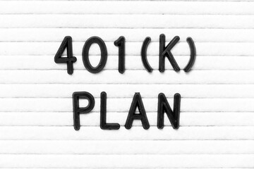 Black color letter in word 401(K) plan on white felt board background