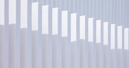 White concrete fence with outdoor wall and abstract architecture. Clear and beautiful shadows. modern design ideas