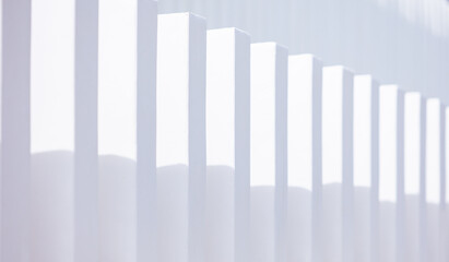 White concrete fence with outdoor wall and abstract architecture. Clear and beautiful shadows. modern design ideas